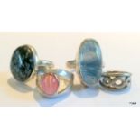 Four ladies' silver rings