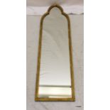 A gilt framed dressing mirror 124 x 33cm