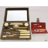 Ivory handled manicure set with mirror fitment in original fitted box