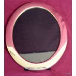 A Large 29cm Sheffield 1985 solid silver oval photo frame