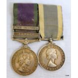 A mounted medal pair consisting of a General Service Medal with Malay Peninsula & Borneo clasps