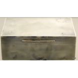 Silver cigarette box with engine-turned decoration, hallmarked London 1916. Measuring 14cm x 9cm x