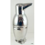 An unusual cocktail shaker in the form of a penguin