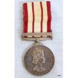 A Naval General Service Medal with Near East clasp named to D/MX 902409 J.L. Barnett E.R.A.5. R.N.