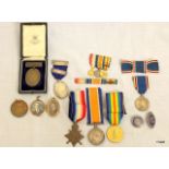 A WW1 medal trio named to EM Keats of the British Red Cross & St John of Jerusalem with dress