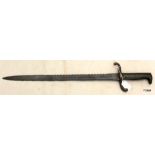 A Prussian model 1871 NCOs saw backed bayonet 60cms overall length with pitting to the blade