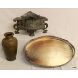 A silver plated serving tray 47cm, an ornate silver plated/pewter planter 38cm and a brass urn 28