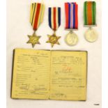 A WW2 medal group of four including the Africa and France & Germany Stars with his Soldiers