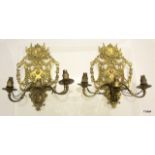 Pair of ornate French cast brass triple wall lights on ornate back plates