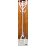 A wrought iron hat stand 180cm tall