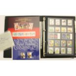 A stamp album containing collection of GB mint stamps