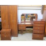 A Stag tallboy wardrobe, dressing table and bedside cabinet