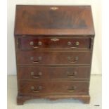 A mahogany Bureau with fitted inside and 4 draws below