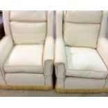 A pair of wingback fireside chairs