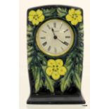A Moorcroft buttercup clock 16cm high