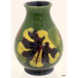 A Moorcroft small Hibiscus vase 15cm high x 5cm neck x 6cm base