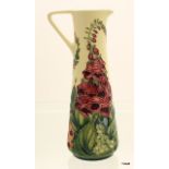 A Moorcroft Foxglove tall jug 24cm high x 10cm neck x 5cm base signed