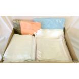 A large box containing vintage linen to include Irish bed linen and Irish banquet table cloths