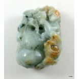 A carved Jade depicting monkeys