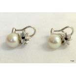 A Pair of 18ct White Gold Diamond and Cultured Pearl Earrings.