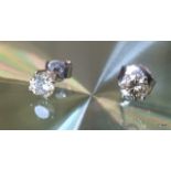 A Pair of 14ct White Gold Diamond Stud Earrings of 70 Points