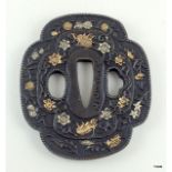 A bronze signed tsuba