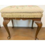 A mahogany cabriole legged piano stool