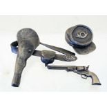 A Confederate States of America miniature cap, belt with holster with six gun all cast in pewter