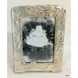 A silver picture frame with easel back