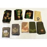 A quantity of British military cloth rank insignia mostly in a new unused condition