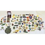 Approximately 100 lapel badges including military