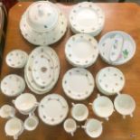 A large mixed dinner service with soup tureens