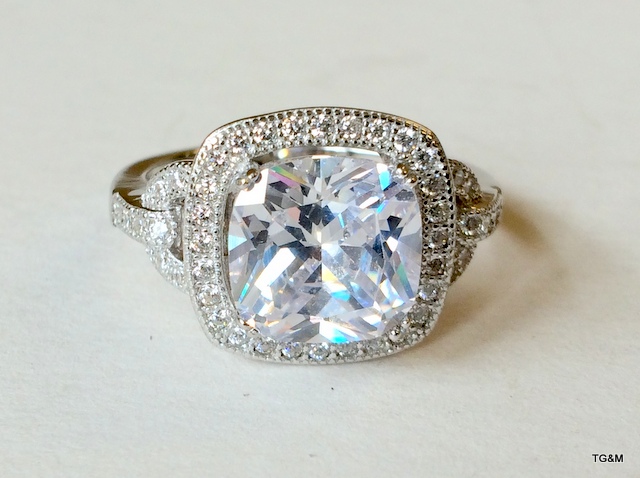 A silver and large cz dress ring