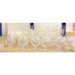 A large quantity of crystal and cut glass to include a set of Brandy glasses (36)