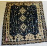 An antique Sirjan carpet 3 medallion in cream and ink blue 184 x 154cm