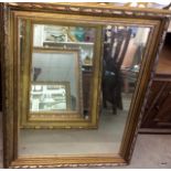 A gilt framed mirror 90 x 70cm