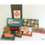 A box of miscellaneous board games