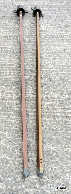 A pair of vintage brass fuel tank dippers