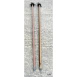 A pair of vintage brass fuel tank dippers