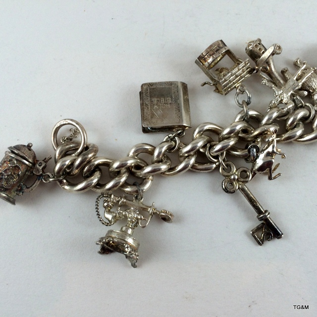 Silver charm bracelet and 13 charms 89gm - Image 3 of 5