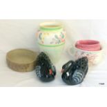 A pair of black swans/porcelain and collection of pottery including a large vase