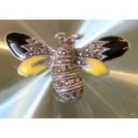 A silver and plique-a-jour bug brooch