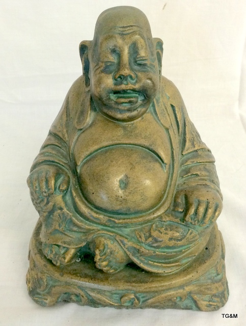 A bronzed statue of a Buddha approx 20cm high
