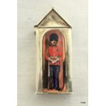 An unusual silver vesta in the form of a sentry box with enamel pictorial image of a guard