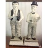 A pair of Laurel and Hardy figures