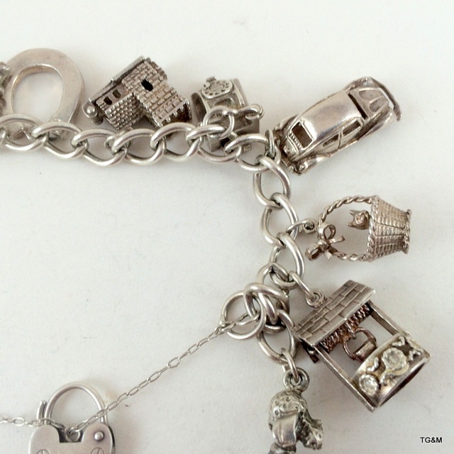 Silver charm bracelet and 11 charms 58gm - Image 4 of 7