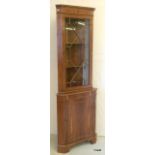 A Mahogany corner cupboard