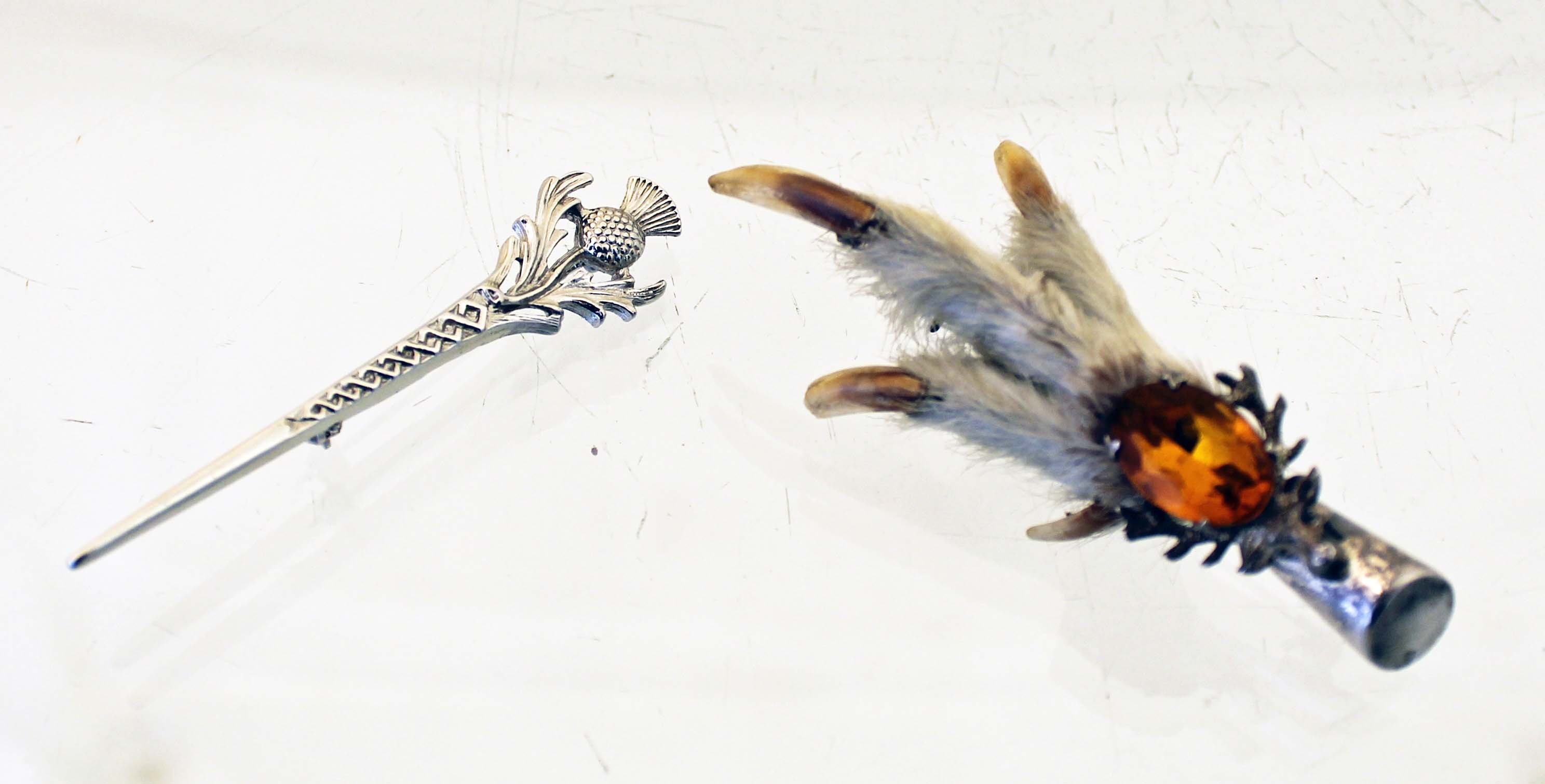 A Scottish silver Ptarmigan bird claw brooch and a chrome thistle brooch - Image 2 of 4