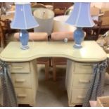 A kidney shaped dressing table and 2 matching bedside lamps