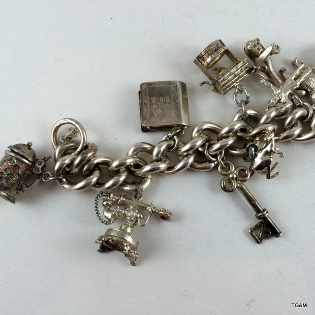 Silver charm bracelet and 13 charms 89gm - Image 2 of 5